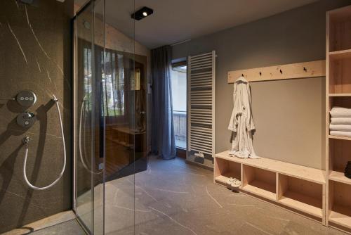 a bathroom with a shower and a walk in shower at AHORN7 in Reit im Winkl