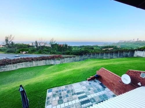 an aerial view of a yard with a frisbee at Anchored Inn II - A Slice of Heaven in Beautiful Scottburgh in Scottburgh