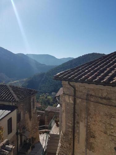 a view of a town with mountains in the background at MARMORE HOUSE in Collestatte