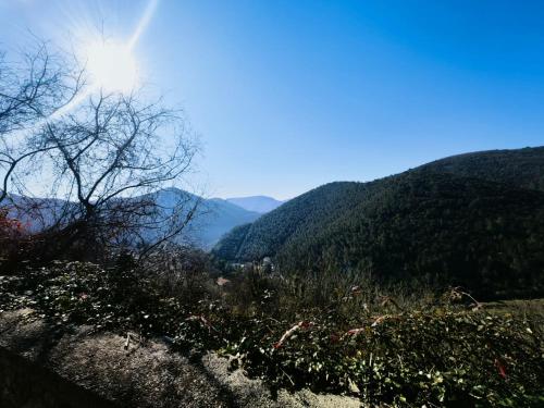 a view of a valley with mountains in the background at MARMORE HOUSE in Collestatte