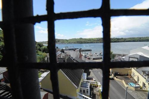 a view of a river from a window of a building at Ballyhack by the Sea in Arthurstown