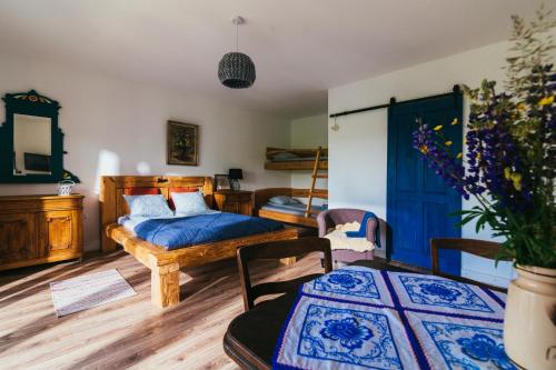 Posteľ alebo postele v izbe v ubytovaní Apartamenty na Pastwisku
