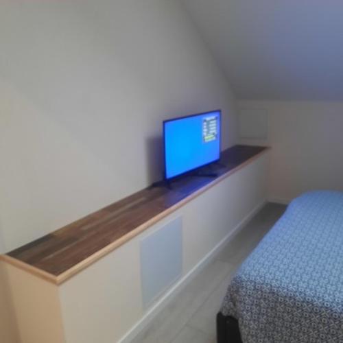 Chez danielにあるテレビまたはエンターテインメントセンター