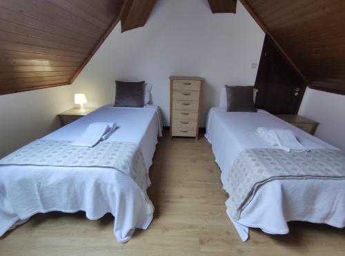 Postel nebo postele na pokoji v ubytování casa cardeal saraiva