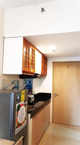 Η κουζίνα ή μικρή κουζίνα στο Maki House Condo