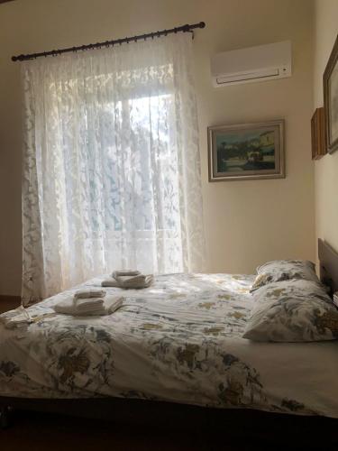 Dimora del Bosco tesisinde bir odada yatak veya yataklar