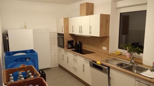 Kuchyň nebo kuchyňský kout v ubytování Belzesaltescheune Ferienwohnung Rhön