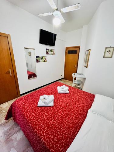 Ένα ή περισσότερα κρεβάτια σε δωμάτιο στο Hotel Principe