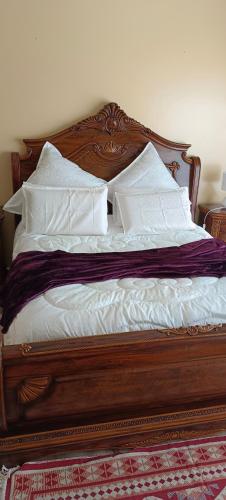 Ένα ή περισσότερα κρεβάτια σε δωμάτιο στο Repose Guest house!