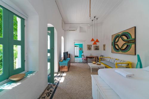 A seating area at Casa Angelina Lindian House with large garden