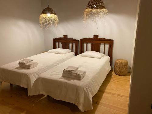 Säng eller sängar i ett rum på Casinha da Avó Rosário