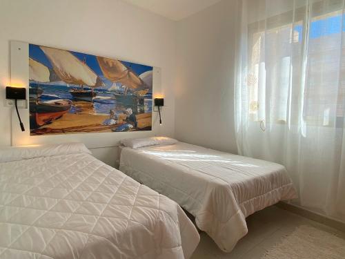 Posteľ alebo postele v izbe v ubytovaní Sunrise Studio Sorolla, 150 m de la playa