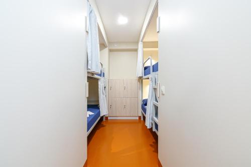 Katil atau katil-katil dalam bilik di Turoqua Hostel