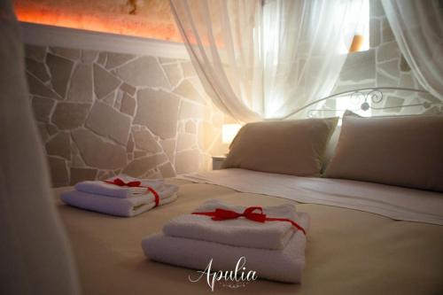Apulia Relax Roomにあるベッド