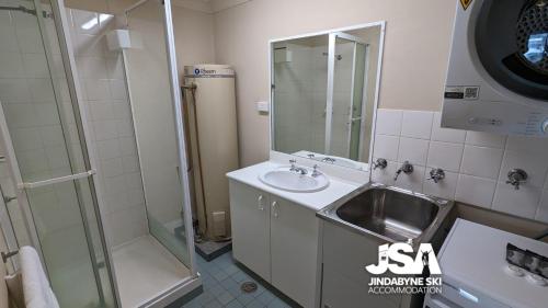 a bathroom with a sink and a shower at Razorback 2 in Jindabyne