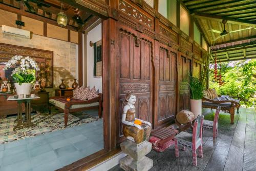 Χώρος καθιστικού στο Villa Kampung Kecil Boutique Hotel