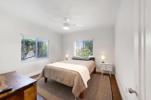Llit o llits en una habitació de Miami Art Deco Home By Pmi