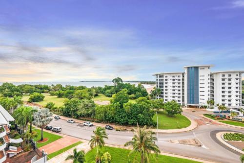 an aerial view of a street in a city with buildings at Captain's Lookout - Penthouse Living at Cullen Bay in Darwin