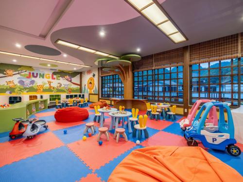 a childrens play room with a lot of toys in it at Yoko Onsen Quang Hanh in Cẩm Phả