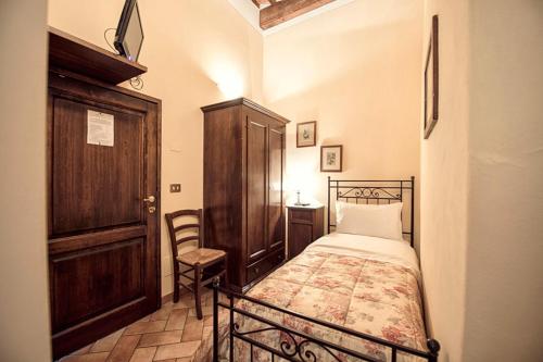 Postel nebo postele na pokoji v ubytování Corte Dell' Oca