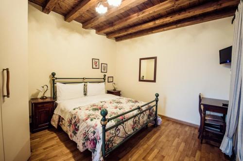 Postel nebo postele na pokoji v ubytování Corte Dell' Oca