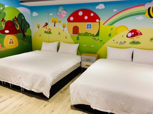Postel nebo postele na pokoji v ubytování Have Fun Hotel