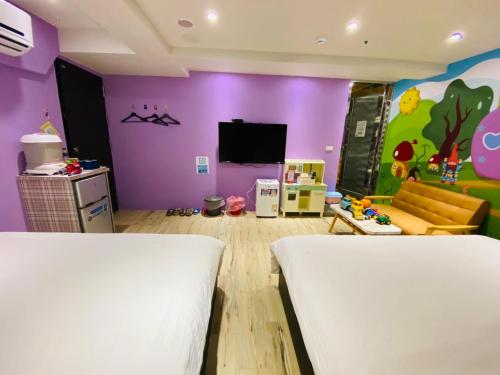 TV a/nebo společenská místnost v ubytování Have Fun Hotel