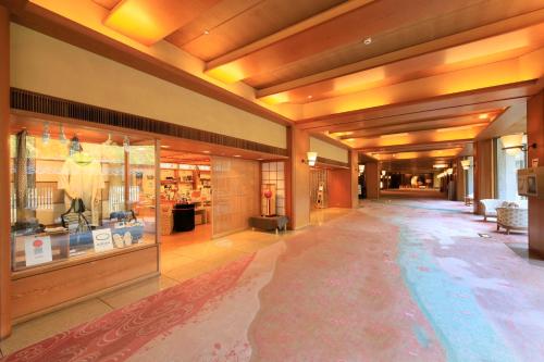 a hallway of a building with a display case at Bankokuya in Tsuruoka