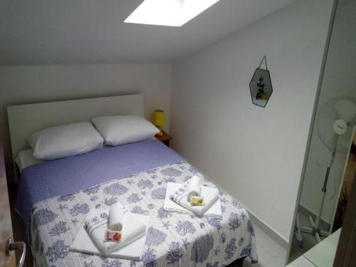 Katil atau katil-katil dalam bilik di Apartman Sutalo
