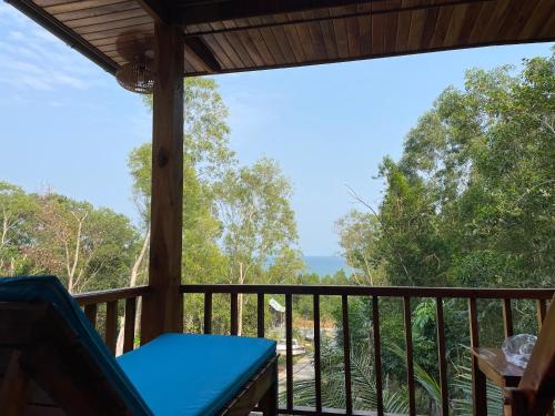 a view from the porch of a tree house at COZY HOME PHU QUOC in Phu Quoc