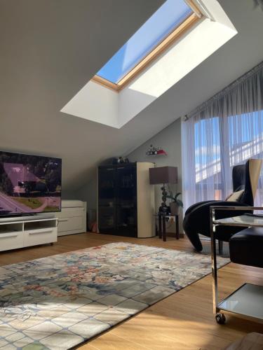 TV a/nebo společenská místnost v ubytování New Nida