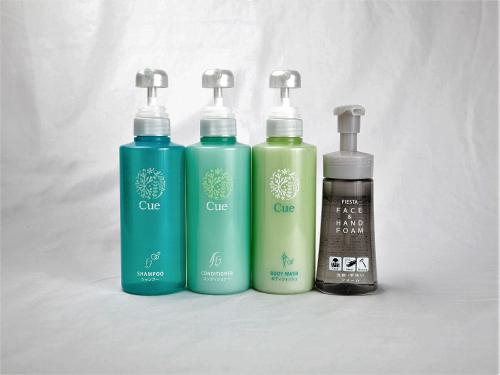 three bottles of disinfectants are sitting next to each other at Hotel Route-Inn Nagahama Inter in Nagahama