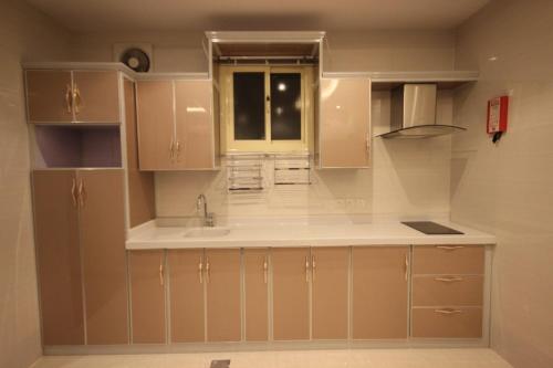 A kitchen or kitchenette at Suit los