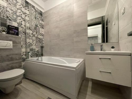 Et badeværelse på Luxury Apartment