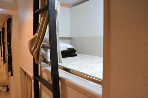 Llit o llits en una habitació de 1 Night 1980 Hostel Tokyo Asakusa Simple Stay
