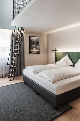 Cama ou camas em um quarto em Stadthotel Goldenes Schiff