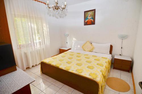 Postel nebo postele na pokoji v ubytování Mon Perin Castrum - Studio Apartment Adriano