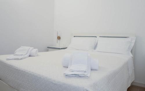Postel nebo postele na pokoji v ubytování Don Pietro Vacanze