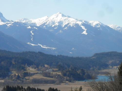 a view of a mountain range with snow covered mountains at Ferienhaus Warmuth in Sankt Stefan an der Gail