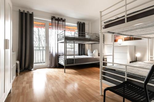 Postel nebo postele na pokoji v ubytování Arkadia - Ferienwohnung - Uhlandweg