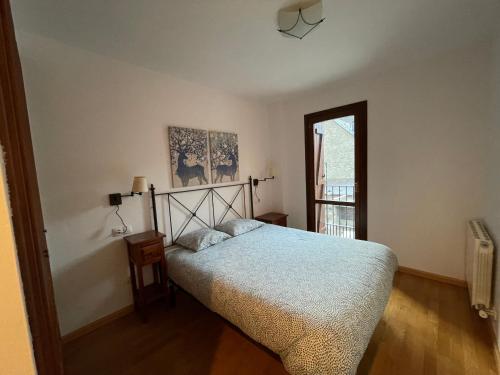 Postel nebo postele na pokoji v ubytování Apartamentos Nevados 28122