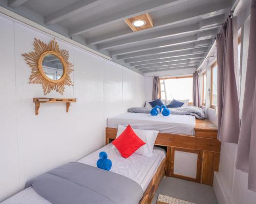 Krevet ili kreveti u jedinici u okviru objekta sharing trip Komodo