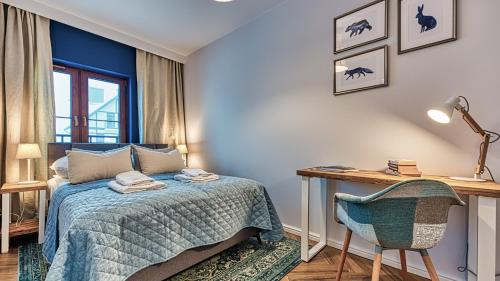Posteľ alebo postele v izbe v ubytovaní Apartament A2 DOMiTU z Basenem, Sauną, Jacuzzi - 5D Apartments