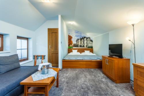 Postel nebo postele na pokoji v ubytování Hotel Jelínkova vila