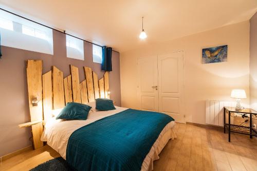 Posteľ alebo postele v izbe v ubytovaní 2 appartements conforts + jardin + parking