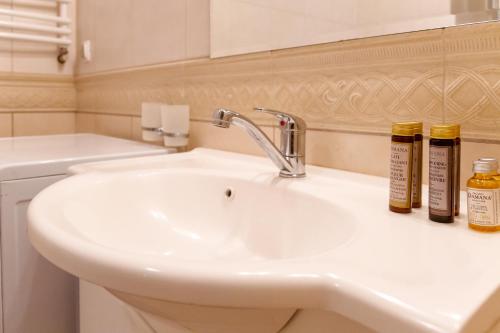 Kúpeľňa v ubytovaní AL-DOM apartamenty Blue Olymp 203