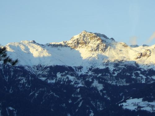 a mountain range with snow on it at Privatzimmer Bundschuh in Amlach