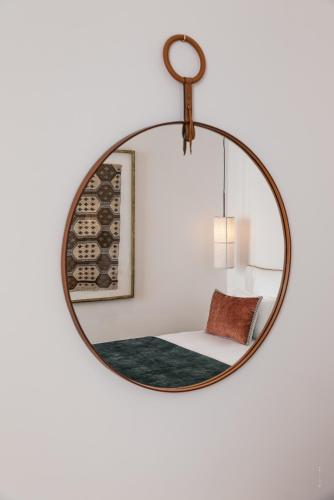 Postel nebo postele na pokoji v ubytování Hôtel Le Mosaïque