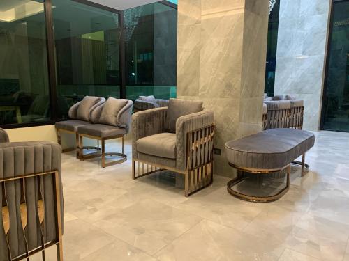 Posezení v ubytování Thana Wisut Hotel