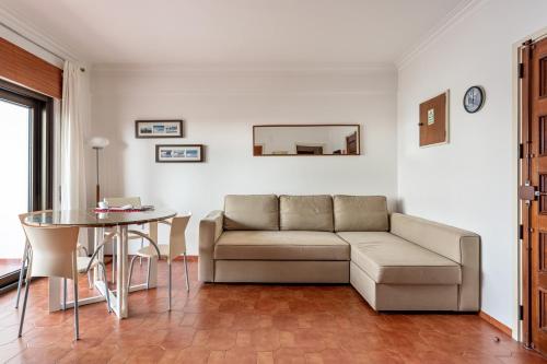 Uma área de estar em ALTIDO Superb flat with Terrace and Ocean Views